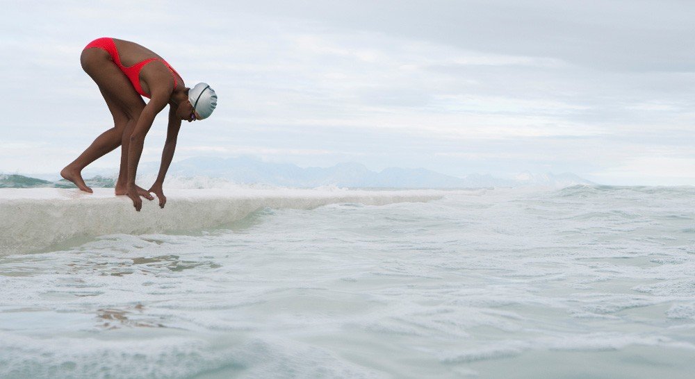 Competitive swimmer swimming while Black