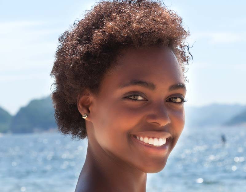 Black girl swimming with Natural hair
